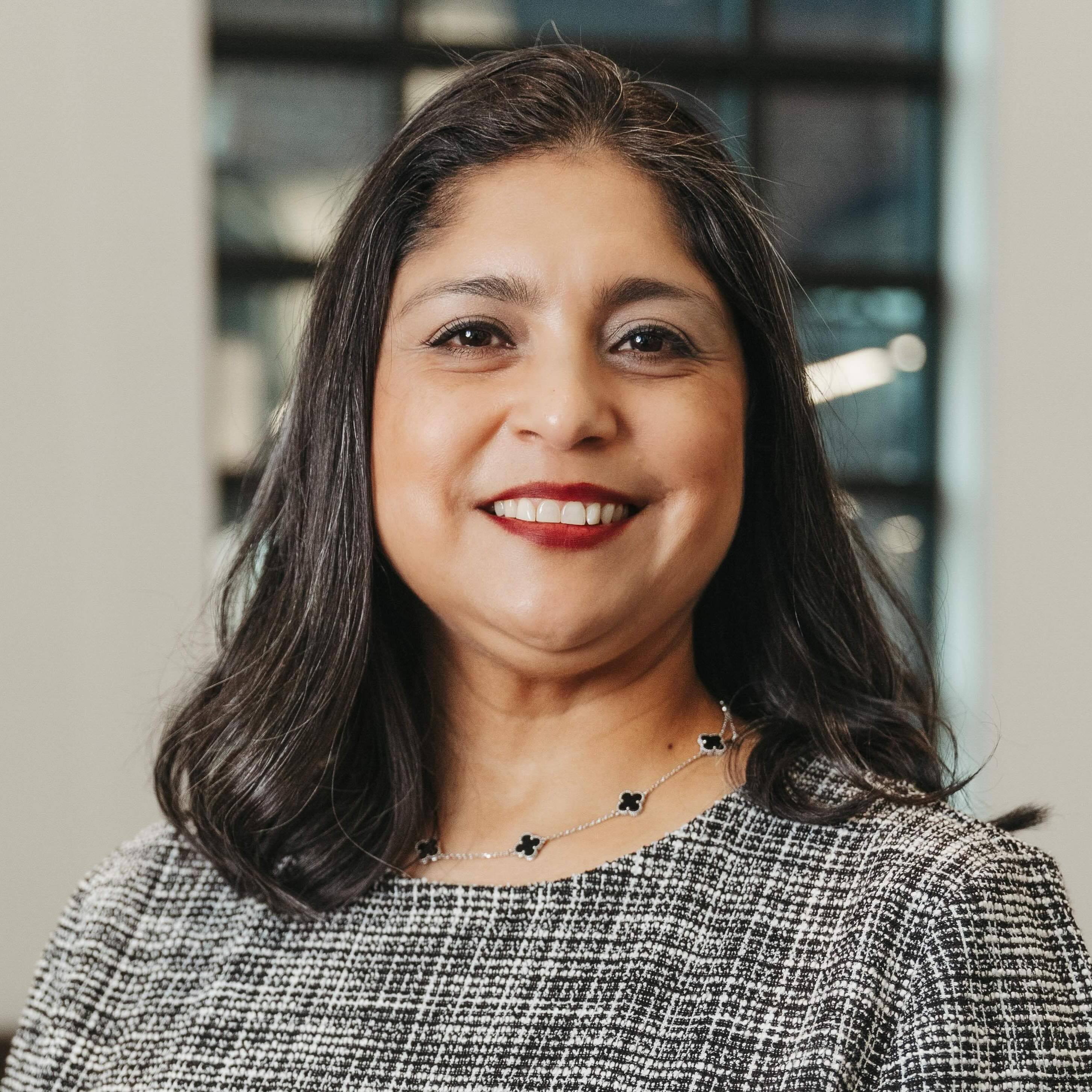 Esme_Headshot_July_2025_4_edited-2